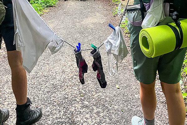 We set off from Roncesvalles under a grey sky, with drizzle greeting us for the first couple of hours. We came across a couple who had devised a clever way of drying their clothing whilst still walking