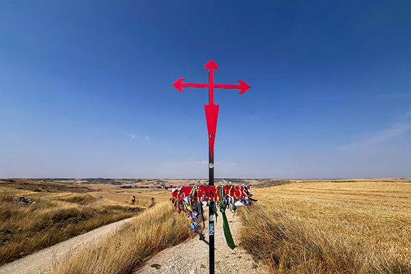 Between Burgos and Hornillos del Camino we passed by a red metal Cruz de Santiago (Cross of Saint James) and entered the vast Meseta
