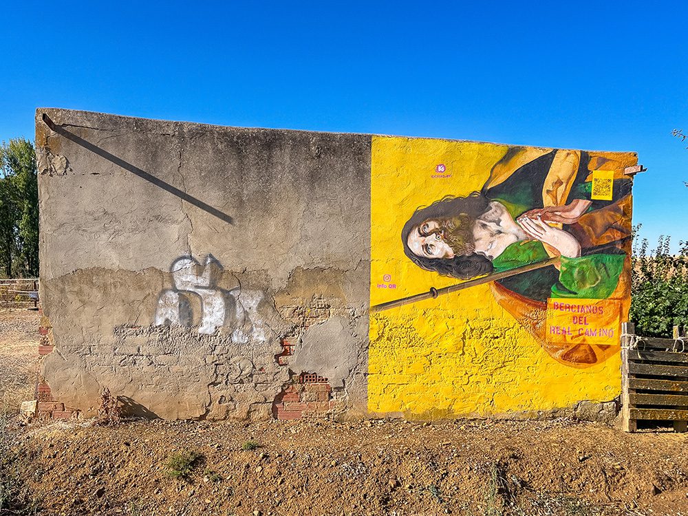Pilgrim mural in Bercianos del Real Camino beside the Camino Francés